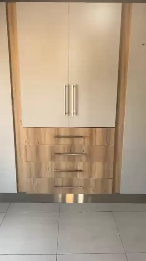 Still from a walk-through video of the built-in wardrobes